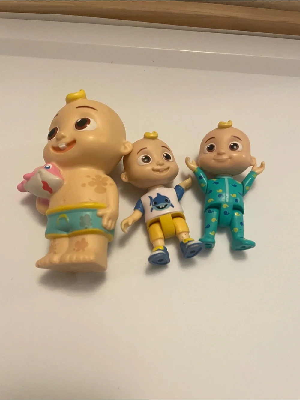 Cocomelon Set of 3 Baby figures Character Figures wearing Yellow, Teal & Blue